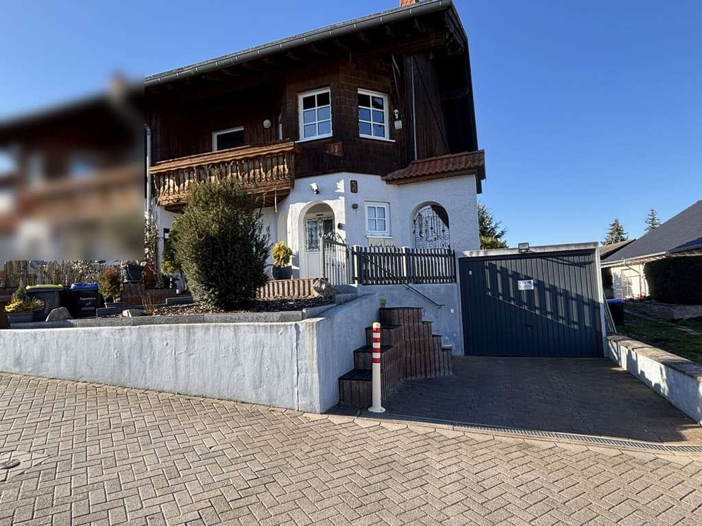 Immobilie in Fürfeld - Außergewöhnliche Architektur trifft auf Idylle! - Bild 3