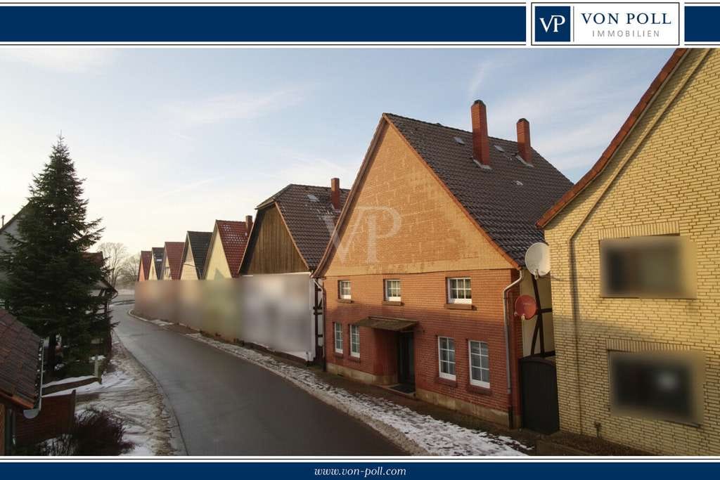 Immobilie in Hessisch Oldendorf - Familiendomizil mit Ausbaupotenzial und gemütlichem Garten in Wesernähe - Bild 0