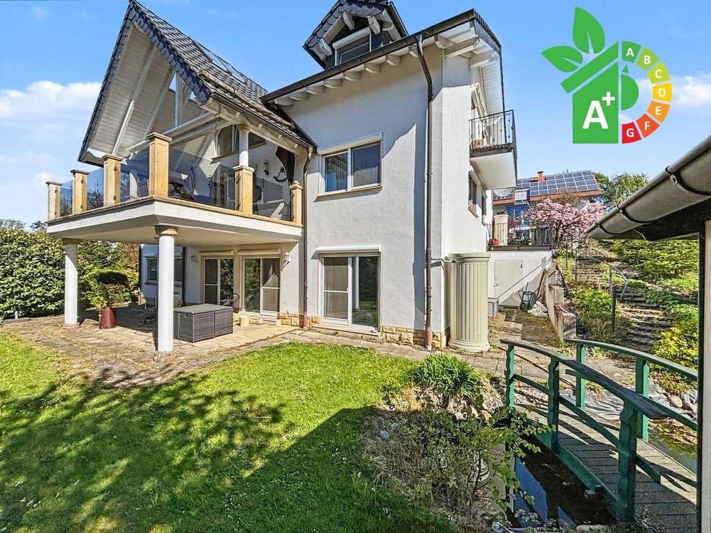 Immobilie in Gersfeld - Hochwertiges Einfamilienhaus mit Einliegerwohnung, Praxisfläche &amp; Wohnrecht in Gersfeld - Bild 0