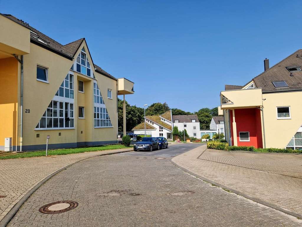 Immobilie in Langerwehe - Langerwehe Jüngersdorf, 2 gut vermietete Eigentumswohnungen mit Pkw Stellplätzen und Potential - Bild 2