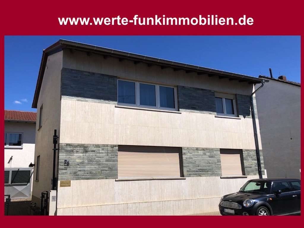 Immobilie in Groß-Gerau - Solider Charme und bleibende Werte! Vermietetes 2-Familienhaus in zentraler Lage von Dornheim - Bild 0