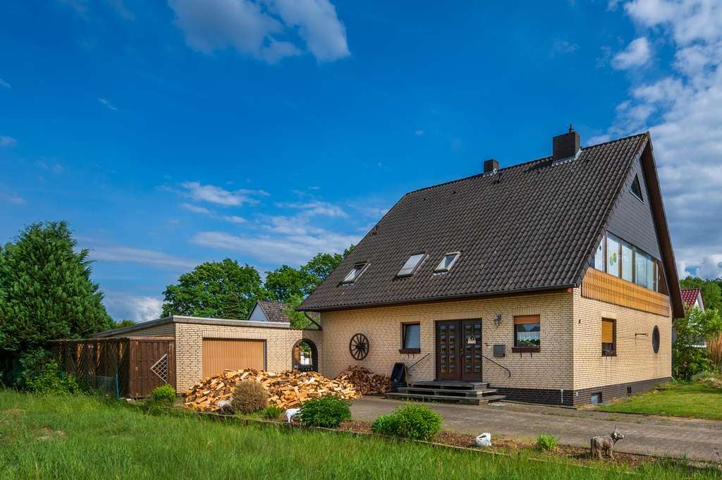 Immobilie in Munster - Viel Platz für Familie und Generationen – Haus mit Einliegeroption - Bild 0