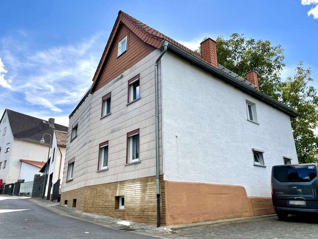 Immobilie in Niddatal - Charmantes Einfamilienhaus mit Remise und schönem Hof - Bild 1