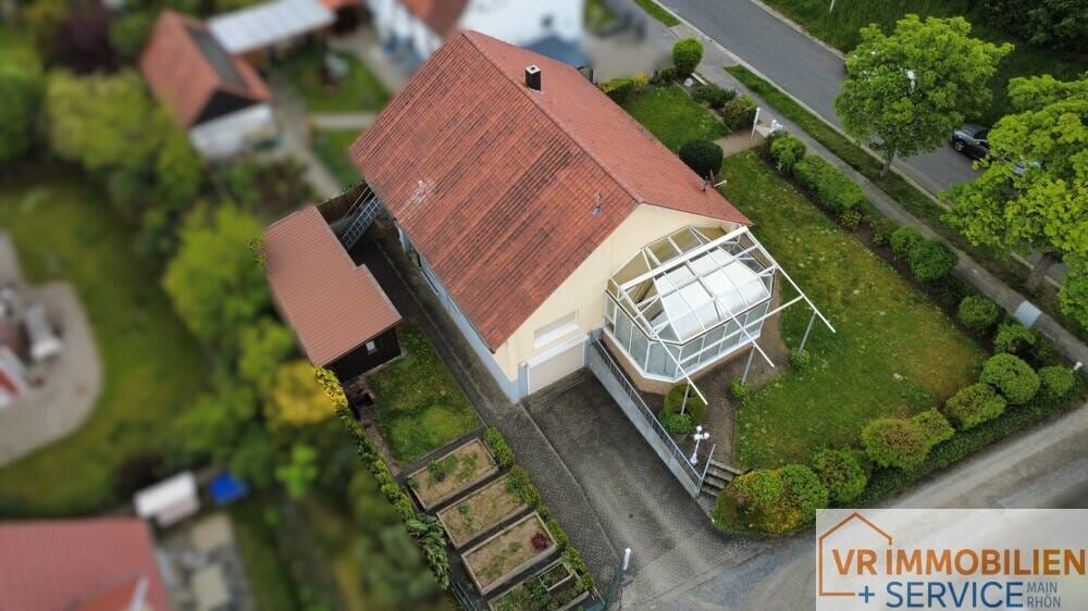 Immobilie in Bad Königshofen im Grabfeld - Wohnen auf einer Ebene mit Wintergarten & großem Garten in ruhiger Lage von 97631 Bad Königshofen! - Bild 4