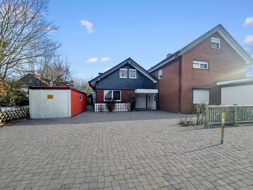 Immobilie in Telgte - energetisch aufgewertetes Haus mit viel Platz für Mehrgenerationen, Familien oder Kapitalanleger - Bild 1