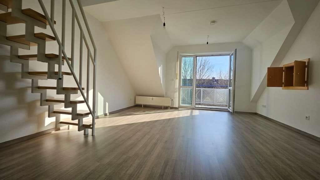Immobilie in Hallbergmoos - Helle 2-Zimmer-Dachgeschosswohnung mit Galerie und Balkon in ruhiger Lage in Hallbergmoos - Bild 0