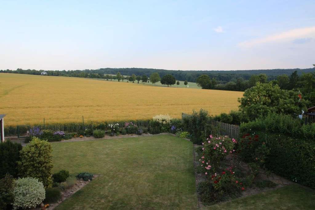 Immobilie in Wennigsen (Deister) - Attraktives Dreifamilienhaus in Ortsrandlage von Bredenbeck mit traumhaftem Ausblick - Bild 4