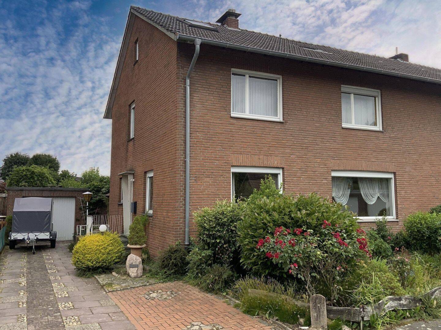 Immobilie in Vreden - Gemütliche DHH mit großem Garten in Vreden! - Bild 1