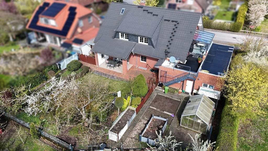 Immobilie in Wolfsburg - Vielseitiges Wohnjuwel: Haus mit zwei Einliegerwohnungen, Vollkeller & geräumiger Doppelgarage & Ca - Bild 4