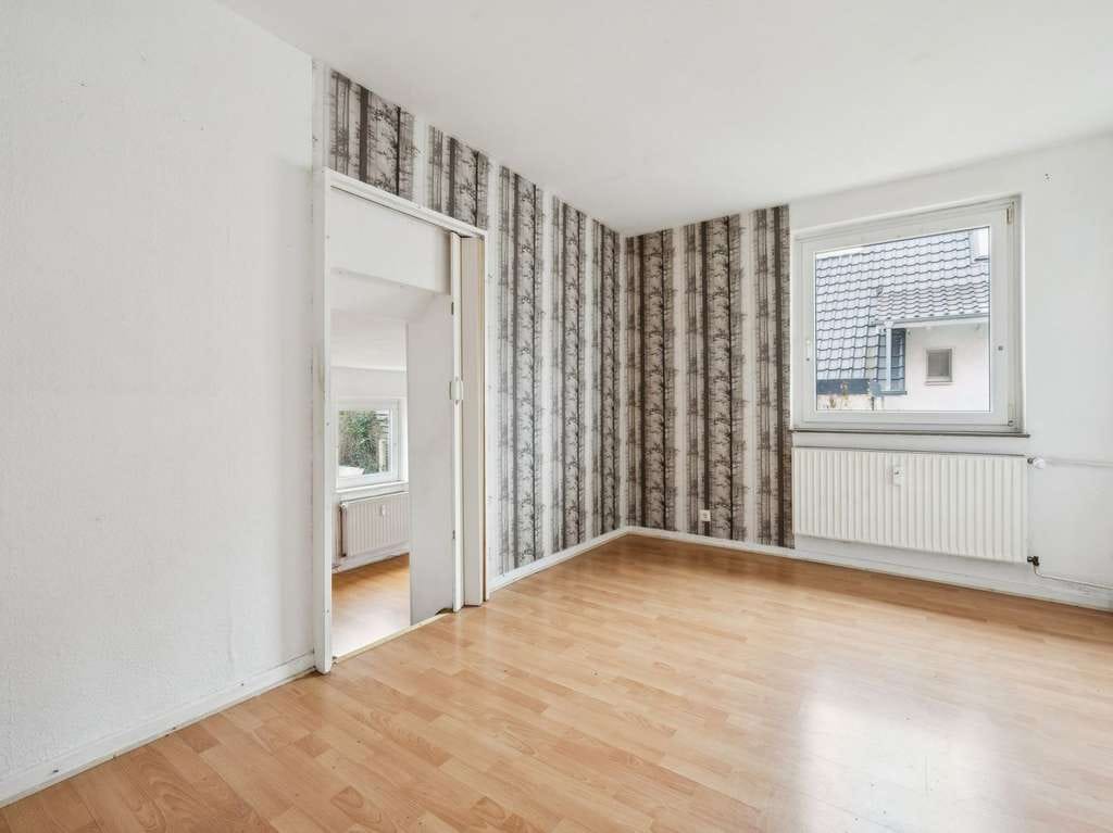 Immobilie in Nordstemmen - Nordstemmen-Heyersum: Zweifamilienhaus mit Garage auf ca. 833 m² großem Grundstück - Bild 4