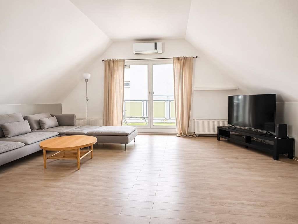 Immobilie in Offenbach an der Queich - Attraktive 2-Zimmer Dachgeschosswohnung mit Balkon & Stellplatz  - Bild 1