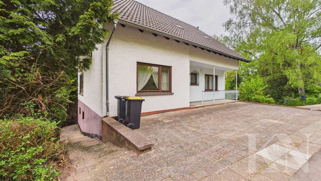 Immobilie in Eppelborn - Einfamilienhaus mit großem Grundstück und vielseitigem Potenzial - Bild 3