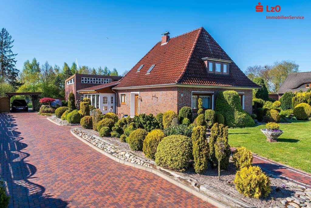 Immobilie in Apen - Modernisierter Bungalow mit Wintergarten und großem Garten in Augustfehn II - Bild 0