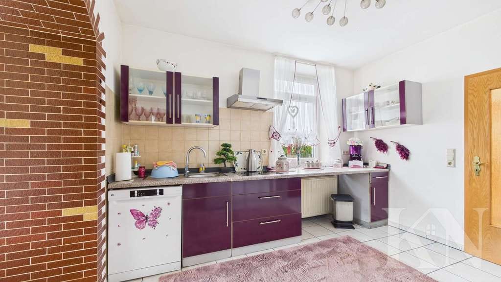 Immobilie in Bruchmühlbach-Miesau - Wohnen mit Charme – helle Erdgeschosswohnung mit Terrasse und Altbau-Flair! - Bild 2