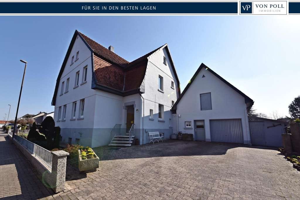 Immobilie in Lindhorst - 1-2 Familienhaus mit Baugrundstück in zentraler Lage - Bild 0