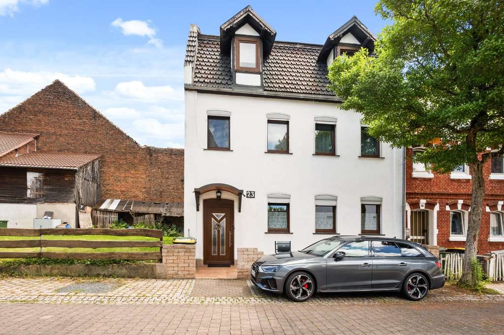 Immobilie in Vellmar - Einfamilienhaus mit pflegeleichten Grundstück zum Kauf - Bild 0