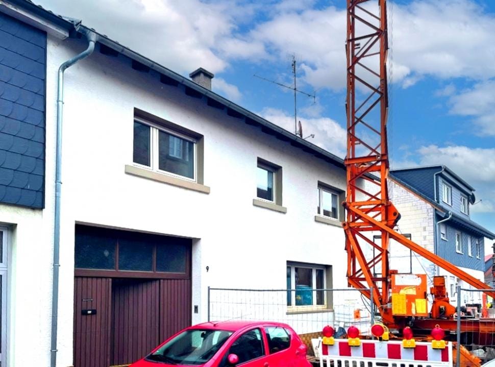Immobilie in Oberhausen-Rheinhausen - GLOBAL INVEST SINSHEIM | Tolles Einfamilienhaus mit Nebengebäude in Oberhausen - Bild 0