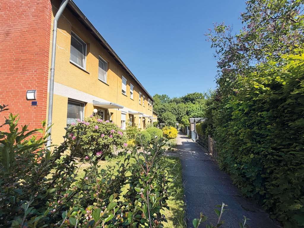 Immobilie in Wahlstedt - Solides Reihenhaus mit Südwest-Garten & Carport! - Bild 2