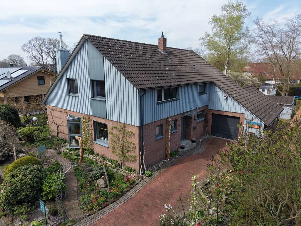 Immobilie in Hude (Oldenburg) - Familienfreundliches Einfamilienhaus mit viel Platz und schönem Garten in ruhiger Lage von Wüsting - Bild 0
