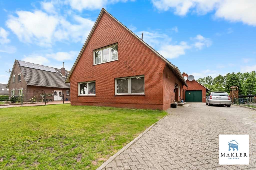 Immobilie in Südbrookmerland - ~~Wo Wohnen und Handwerk zusammenfinden – charmantes Einfamilienhaus mit Extras~~ - Bild 0