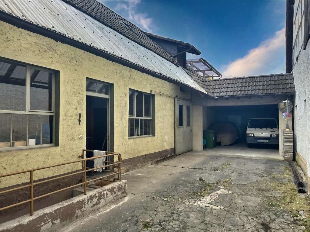 Immobilie in Bellheim - Viel Platz für Hobby oder Beruf - Einfamilienhaus mit Hof, Garage und Werkstatt - Bild 2
