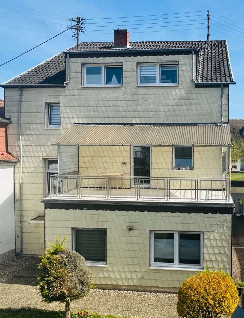 Immobilie in Quierschied - Attraktives 3-Parteienhaus in zentraler Lage von Quierschied - Bild 1
