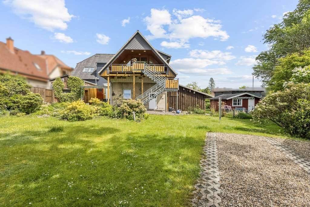 Immobilie in Soltau - Einfamilienhaus mit Einliegerwohnung und traumhaftem Garten - Bild 1