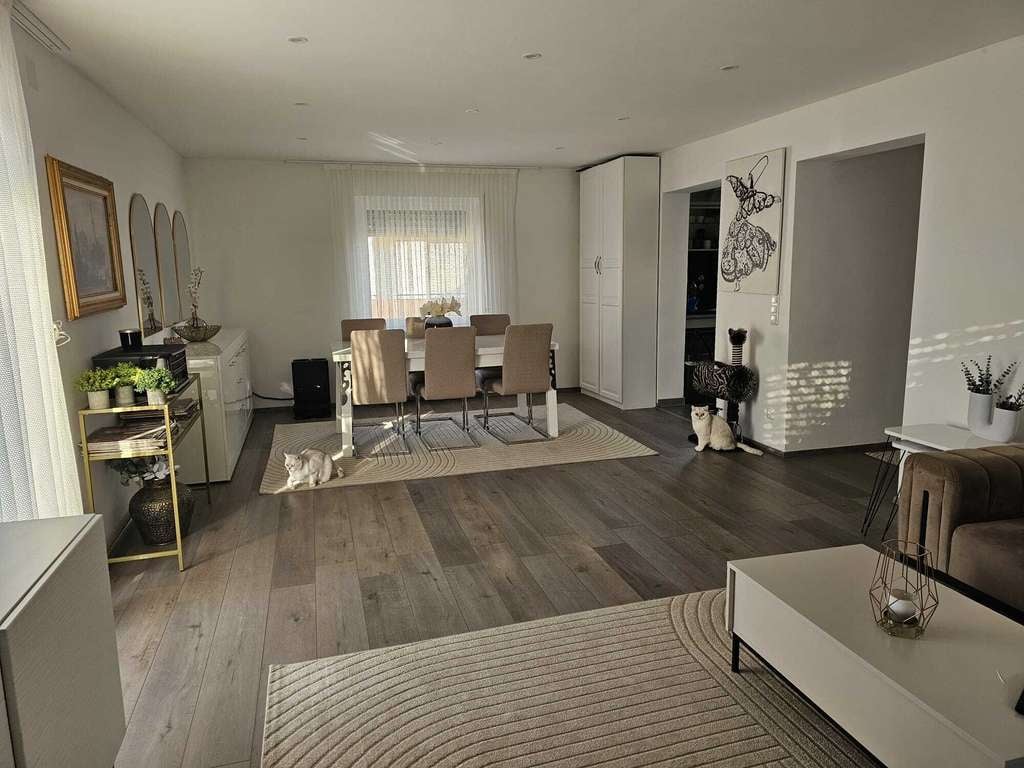 Immobilie in Budenheim - Lichtdurchflutetes Wohnen mit Urlaubsflair – Modernisiertes Zuhause in grüner Lage nahe dem Rhein - Bild 1