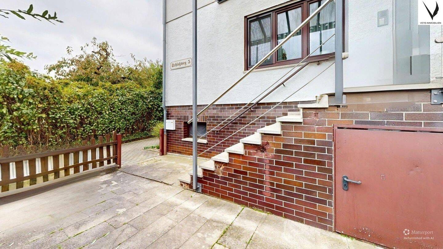 Immobilie in Großrinderfeld - Mehrfamileinhaus mit vielseitiger Nutzungsmöglichkeit - 3 Wohnungen - Bild 2