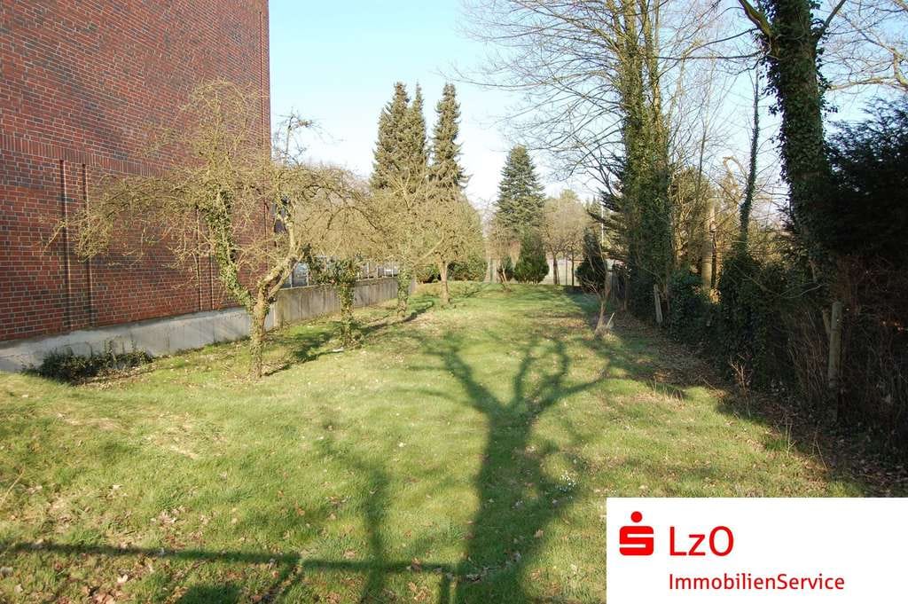 Immobilie in Wildeshausen - Mehrfamilienhaus mit Gewerbeeinheit und Baugrundstück in Wildeshausen - Bild 1