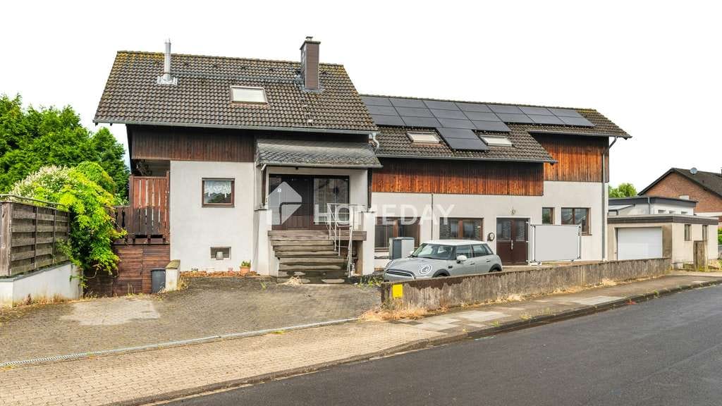 Immobilie in Langerwehe - Wohnen und Arbeiten im Einklang: Gewerbe- und Wohnanwesen mit Sauna, Wallbox, Garage und vielem mehr - Bild 0