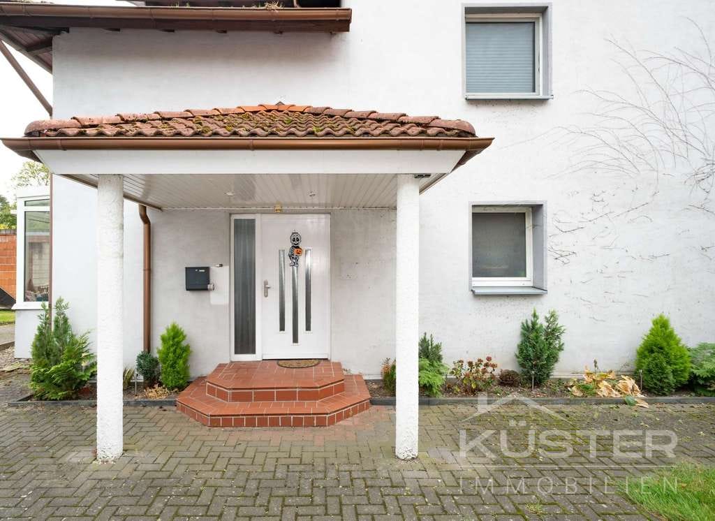 Immobilie in Suthfeld - KÜSTER IMMOBILIEN präsentiert:Exklusives Wohngefühl mit Dachterrasse,Garten und Kamin - Bild 1