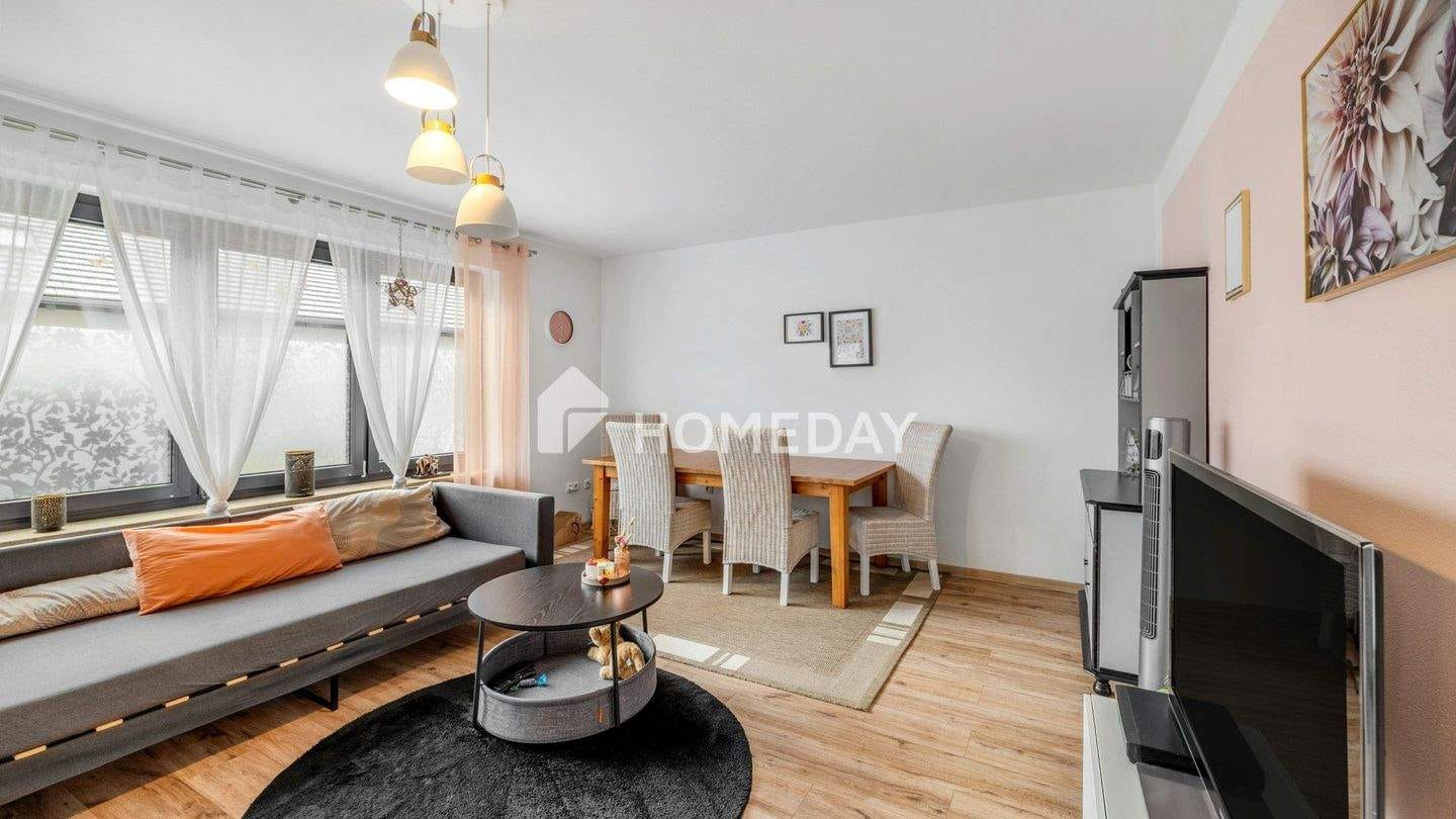 Immobilie in Manching - Helle, modernisierte Wohnung mit durchdachtem Grundriss und gepflegtem Umfeld - Bild 2