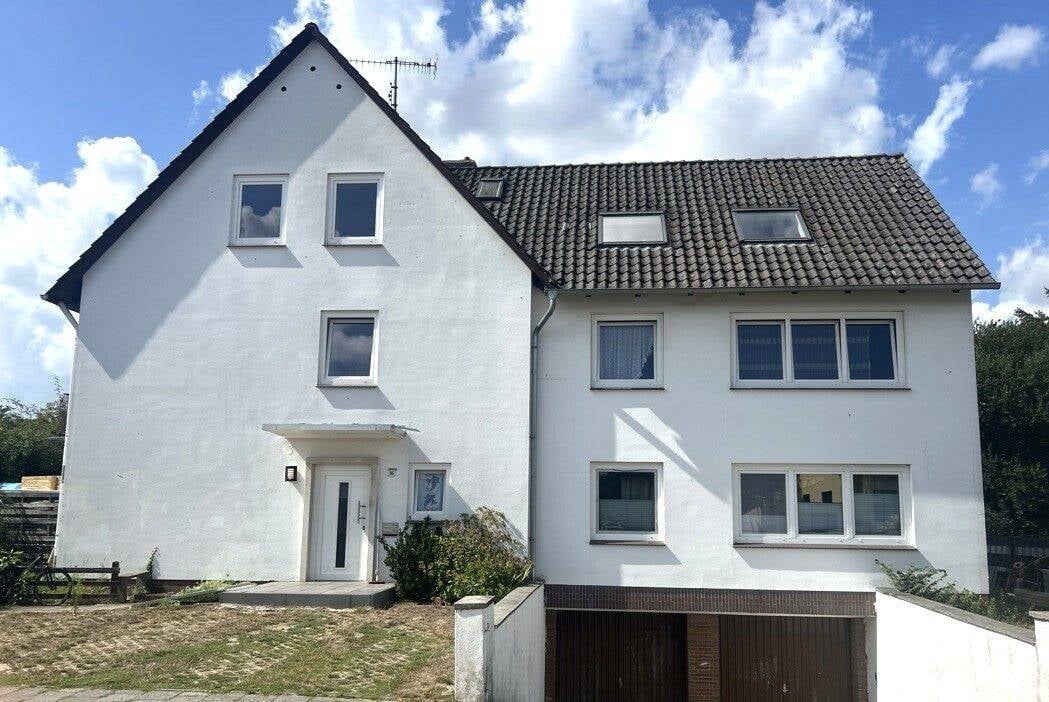 Immobilie in Barnstorf - Ideal für Kapitalanleger! Vollvermietetes 3-Familienhaus in zentrumsnaher Lage von Barnstorf. - Bild 1