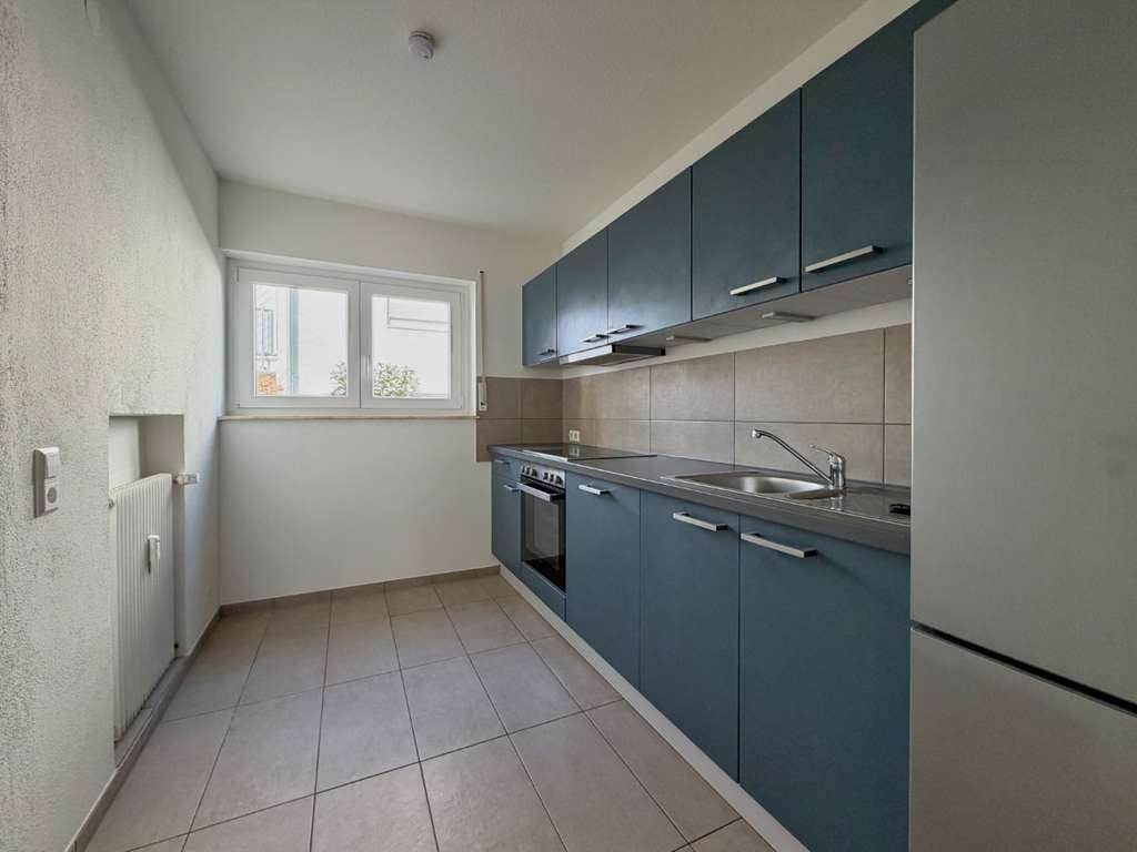 Immobilie in Schallstadt - Haus im Hauss: Modernisierte 4 Zi.-Wohnung + vermietetes 2 Zi.-Apartment - Bild 1