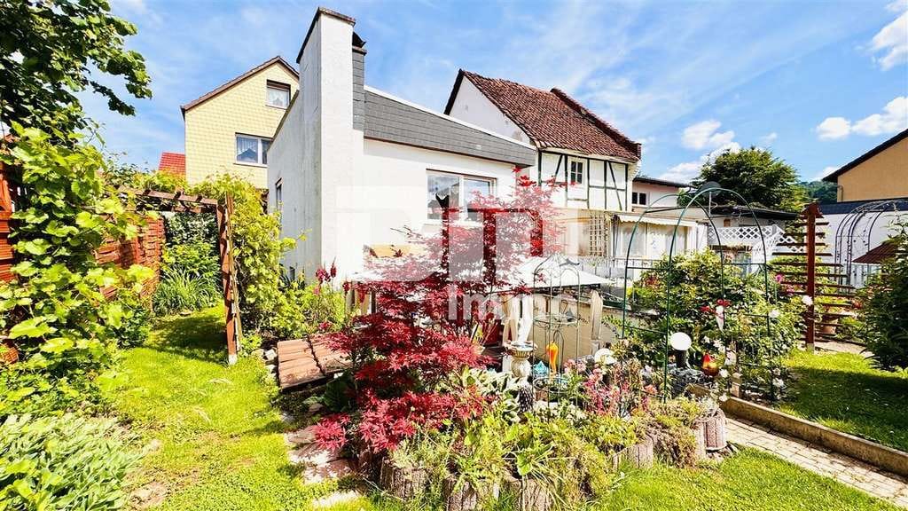 Immobilie in Wehretal - Teilsaniertes Einfamilienhaus mit Anbauten + Nebengebäude auf 1.600 m² Traumgartengrundstück - Bild 2