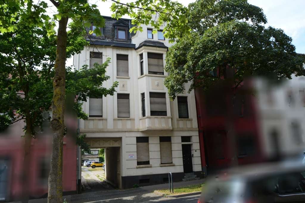 Immobilie in Eschweiler - Mehrfamilienhaus mit Potential und Baugrund vorhanden - Bild 0
