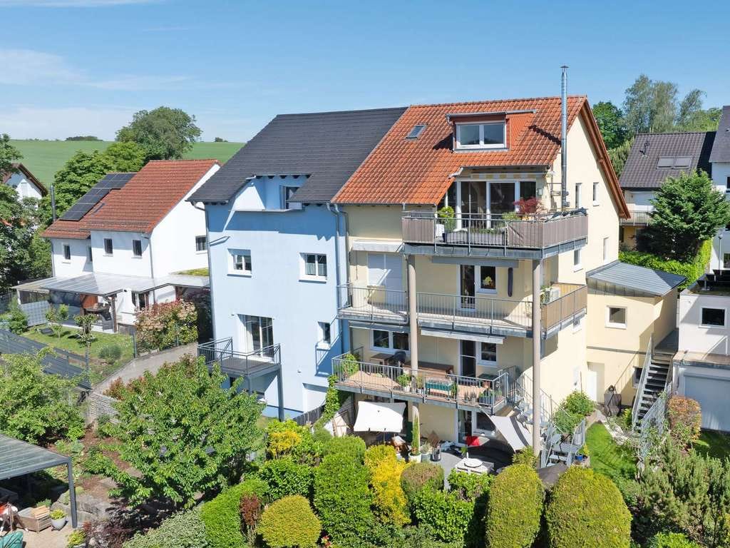 Immobilie in Mauer - Hausgefühl auf drei Ebenen - Exklusiv Wohnen mit Garten, Dachterrasse und Panoramablick in Mauer - Bild 0