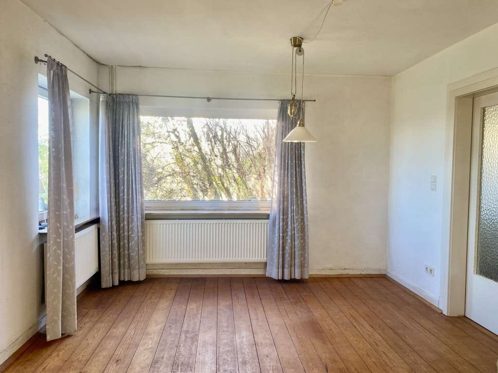 Immobilie in Friedrichskoog - Einfamilienhaus mit Blick über die offene Feldlandschaft - Bild 4