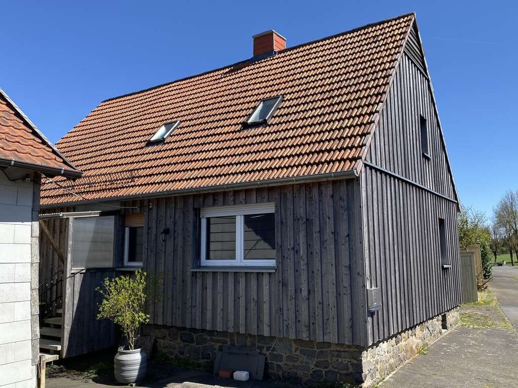 Immobilie in Ulrichstein - Ruheoase - herrlich gelegenes Einfamilienhaus mit Scheune und Garten - Bild 0