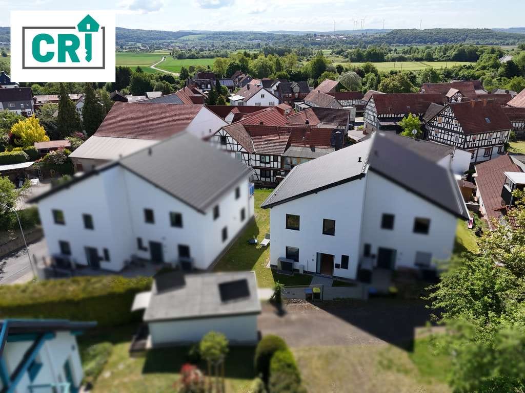 Immobilie in Weimar (Lahn) - Doppelhaushälfte mit Wohlfühlfaktor in Weimar-Niederwalgern! - Bild 0