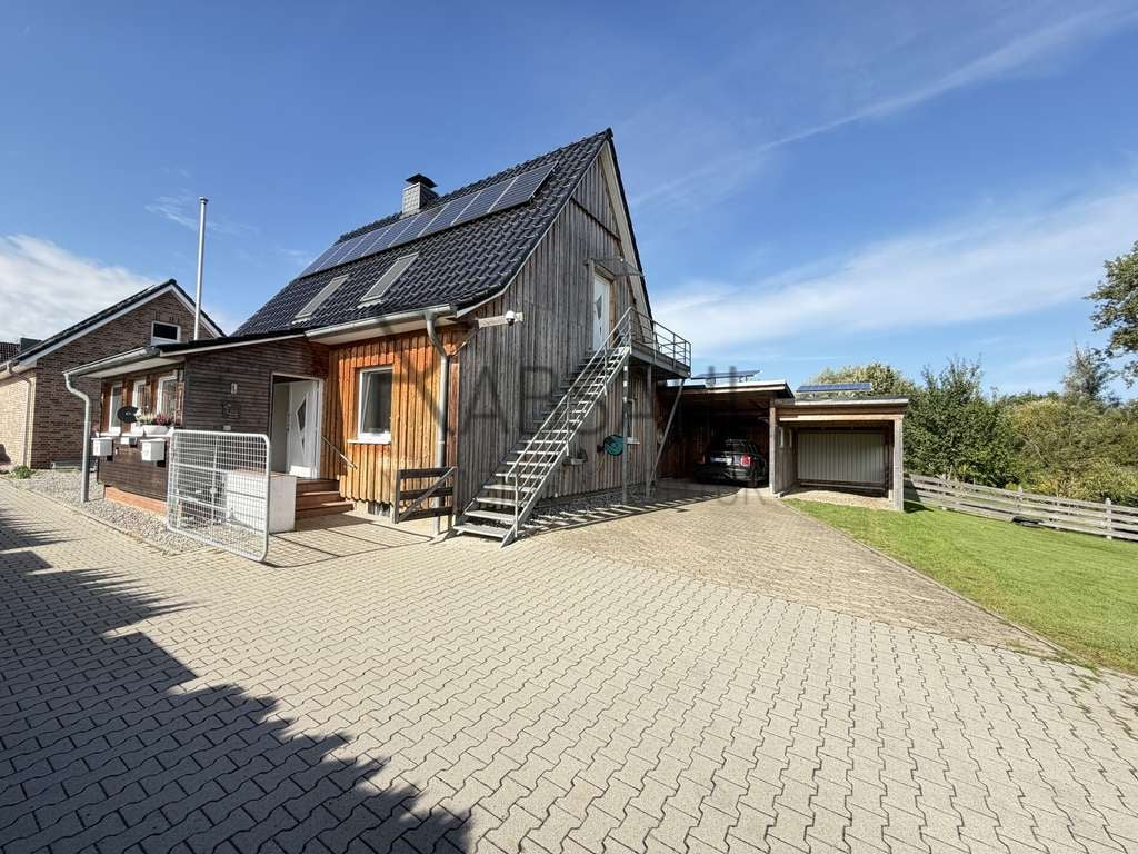 Immobilie in Hittbergen - Zweifamilienhaus auf einmaligem Grundstück in Hittbergen mit Wohnrecht für 1 WE des Eigentümers - Bild 1