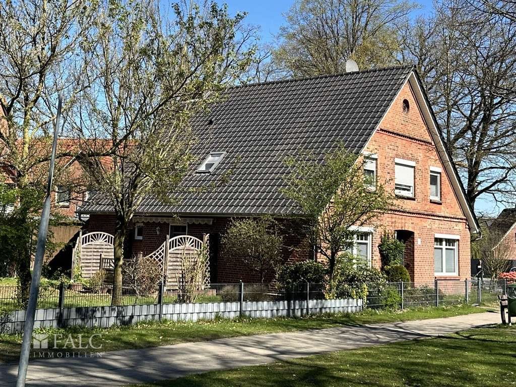 Immobilie in Burweg - Einfamilienhaus mit Einliegerwohnung und Baugrundstück in zentraler Lage von Himmelpforten - Bild 1