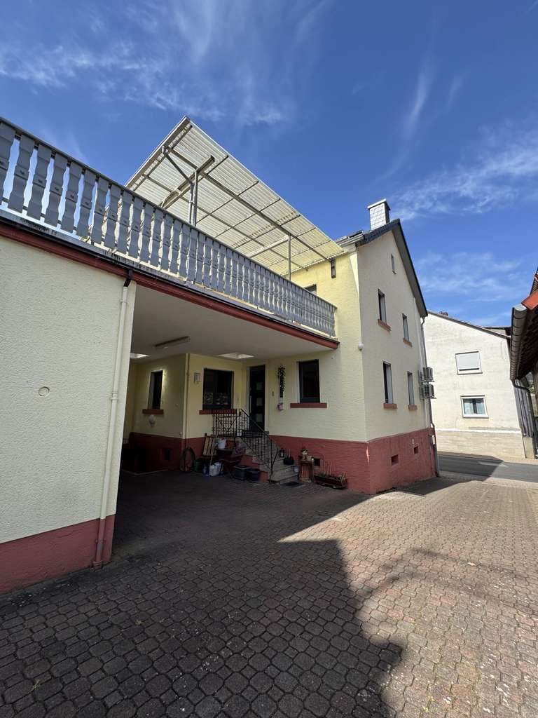 Immobilie in Schöllkrippen - Gemütliches Einfamilienhaus in Schneppenbach mit Garage und Garten - Bild 4