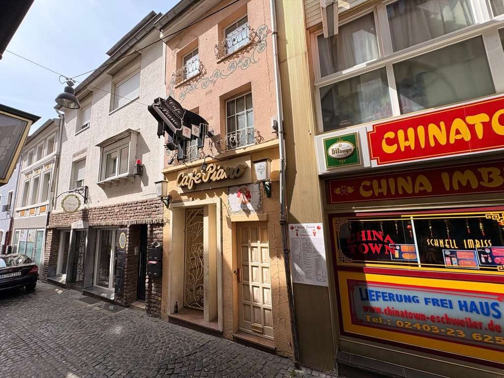 Immobilie in Eschweiler - Sanierungsbedürftige Liebhaberimmobilie mit Charme und vielfältigem Entwicklungspotenzial - Bild 1