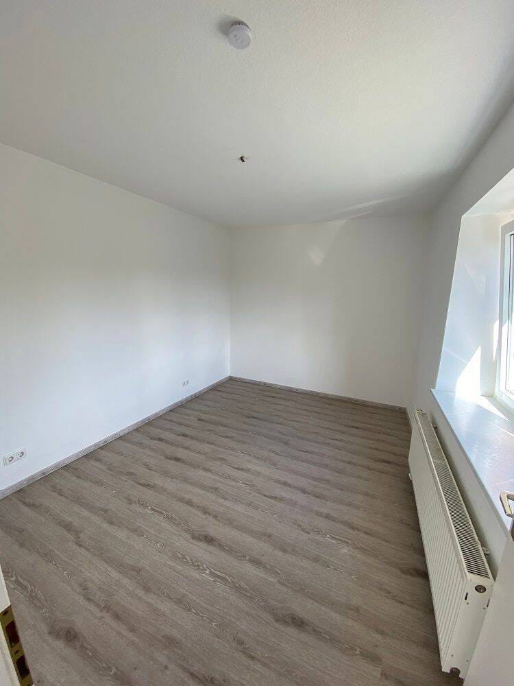 Immobilie in Querfurt - Voll vermietetes Mehrfamilienhaus mit 4 Wohnungen,  Grundstück und Stellplätzen in Querfurt OT Spielberg - Bild 4