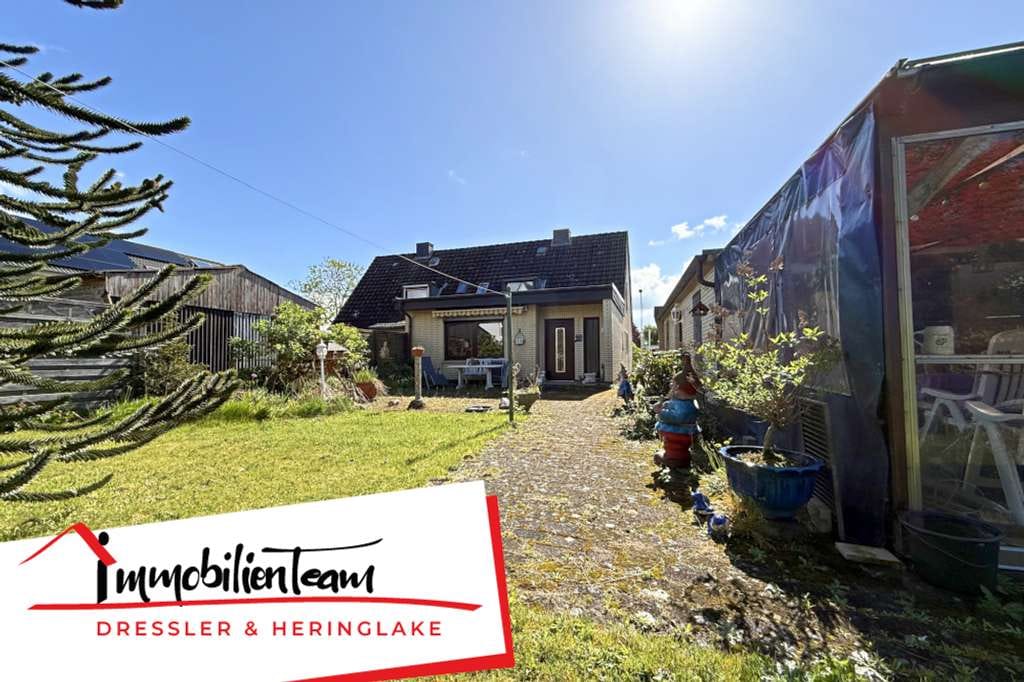 Immobilie in Halstenbek - Platz für die ganze Familie | Doppelhaushälfte mit sonnigem Garten & Garage in Halstenbek-Krupunder - Bild 0