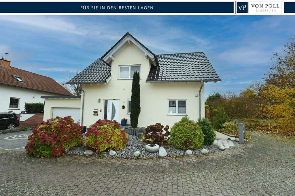 Immobilie in Hahnheim - Naturnahes Familienhaus mit ELW, gepflegtem  Garten mit Teichanlage u. Doppelgarage für Ihr Familien - Bild 0