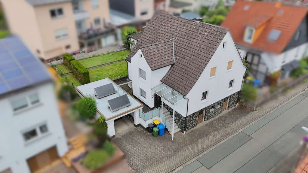 Immobilie in Gladenbach - Sonniges Einfamilienhaus mit Garten in Gladenbach OT - Bild 0