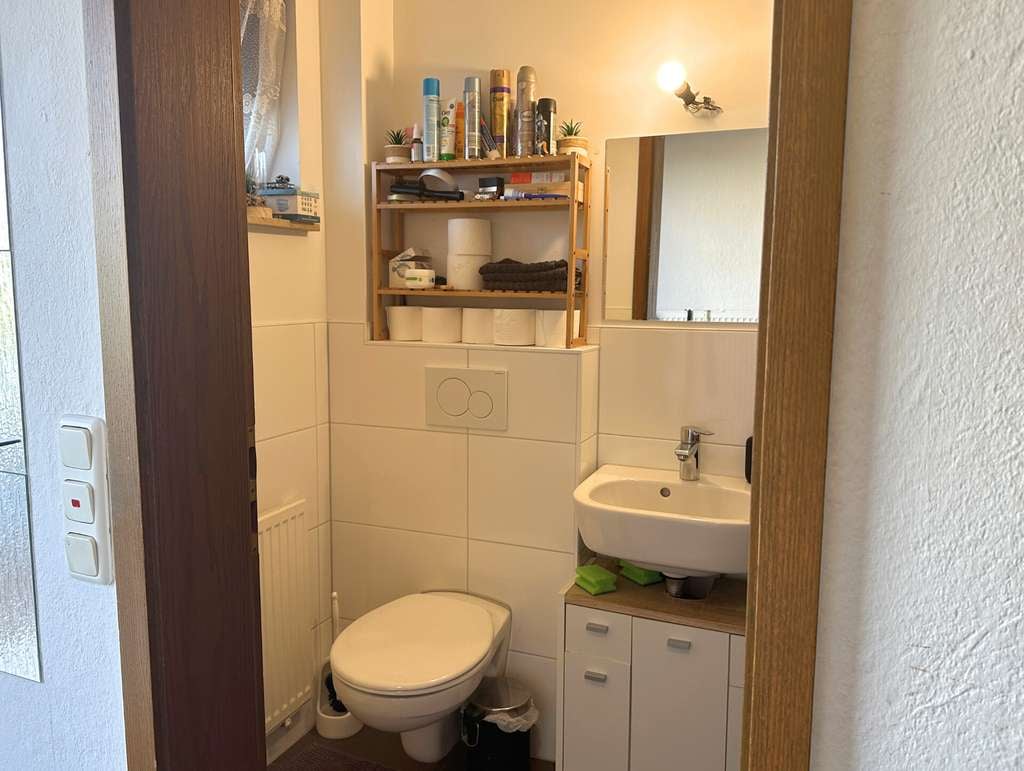 Immobilie in Erlensee - Attraktives Mehrfamilienensemble – Drei vermietete Reihenhäuser in Split-Level-Bauweise in Erlensee - Bild 4